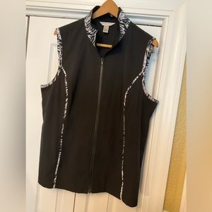 Nice Christopher & Banks black vest with black & white print trim. Zips. XL